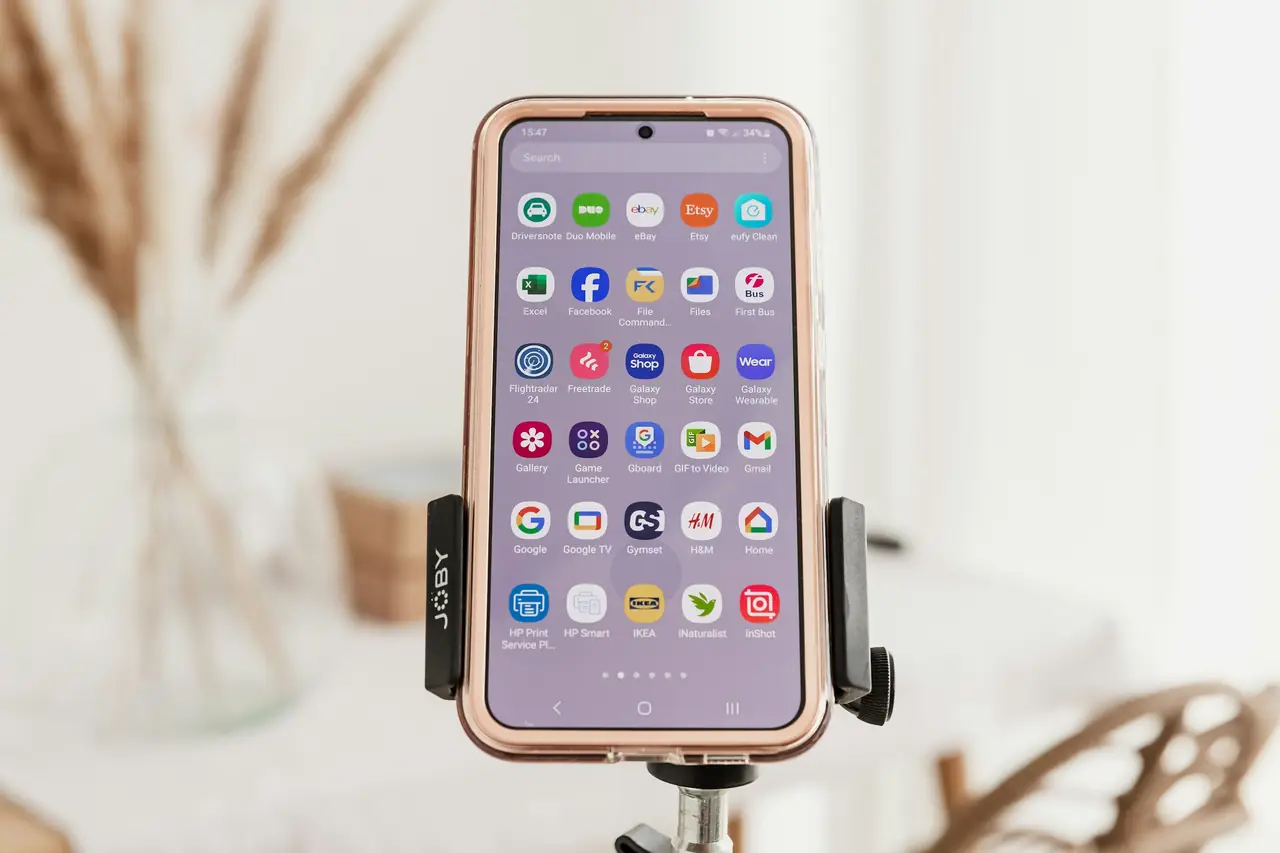 Phone mounted on a tripod holder